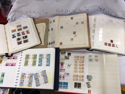 A box containing a large collection of mixed stamps first day covers etc.