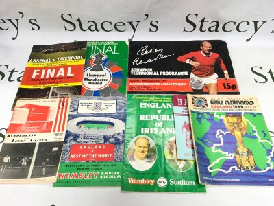 A collection of football programs including a 1966 World Cup program plus souvenir and testimonial examples.
