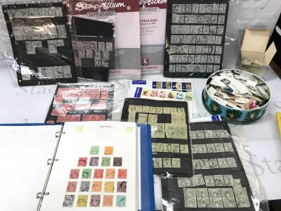 A large collection of world stamps both loose and in albums.