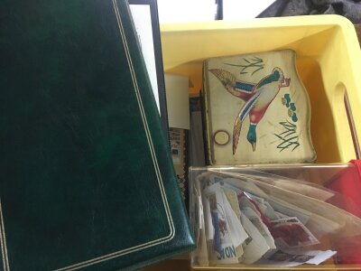 A collection of stamps and postcards, first day covers