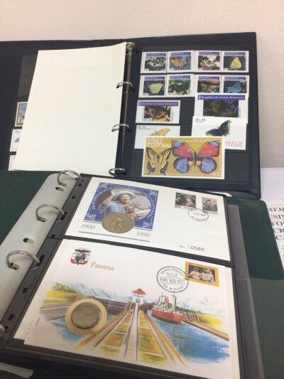 A collection of stamp albums including Marine Heritage an album of stamps pictorial butterflies an album of coin covers British pictorial stamps and others.