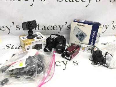 A Collection of cameras including a Nikon Coolpix P530, boxed dash cam, boxed Sony DSC-W55, JVC HDD camcorder