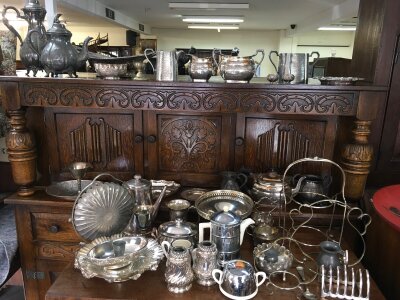 A box containing a Collection of silver plated ware various including a four piece tea set
