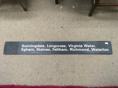 A wooden BR (S) Black and White finger board listing several stations. 122cm wide 15cm tall