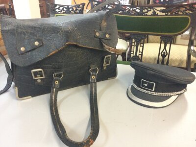 A B.R leather bag with several fault book and publications