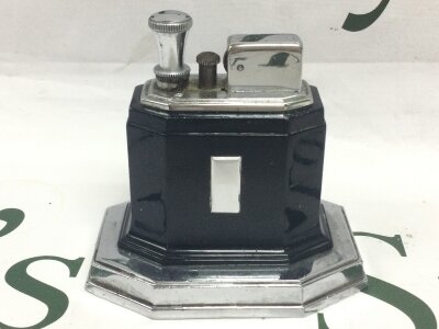 A rare vintage lighter Ronson Art Deco touch tip. 9cm tall