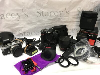 An Olympus OM-1, Nikon D7100, Sigma 30mm, Samyang 8mm fish eye and other camera equipment .