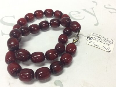 A Bakelite cherry amber style necklace 160 grams, 73cm long
