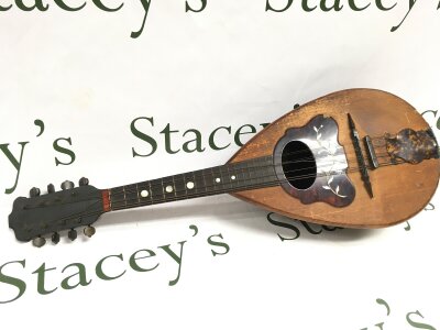 A late 19th century Itamandolin, 58cm long. Cav. Giovanni De Menlo E Figlio Fabbrion Di Pianoforti e. Desposito di Pioni osteri Casa Fondata Nel 1880. Dated 1896