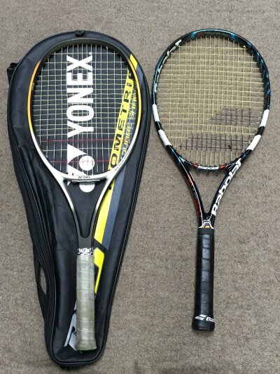 Two Graphite tennis rackets -Barbolat pure drive and Yonex RD power 7