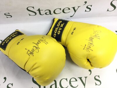 Golds gym boxing gloves signed by Henry Cooper