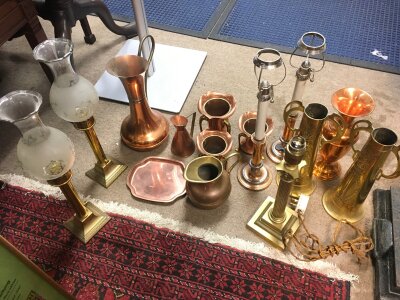 A Collection of Copper and brass vases candle sticks. Tallest 44cm