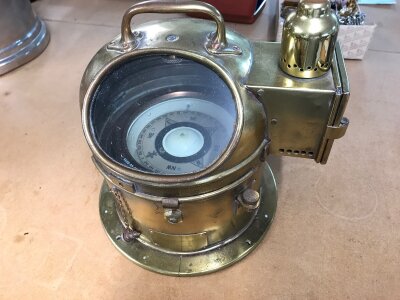 A vintage ships Binnacle compass crafted from brass.