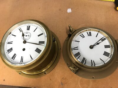 Two ships clocks in brass. 
Larger has a diameter of approximately 23cm
