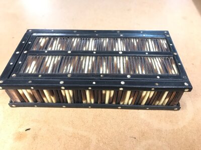 An antique porcupine quill and ebony box. 
Approximately 20cm by 11cm
