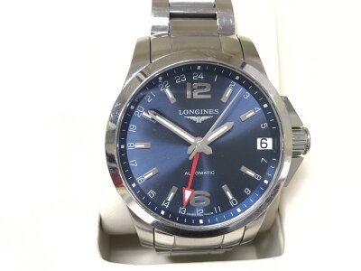 Longines Conquest GMT watch. blue dial and a red GMT hand. Seen running. Box and papers. 45mm including crown.