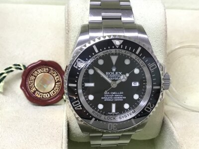 A Rolex Sea Dweller ref 116660 2008. First year of new model. Features the glide lock clasp. Comes with bezel protector, card, box and manuals. Seen running.