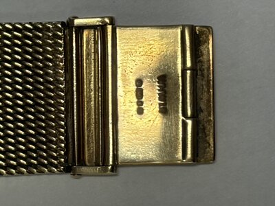 A 9ct gold longines gents wrist watch, Swiss fully jewelled lever movement with champagne dial date and central second hand, case No 311261 complete with a 9ct gold Milanese pattern bracelet hallmarked London 1978