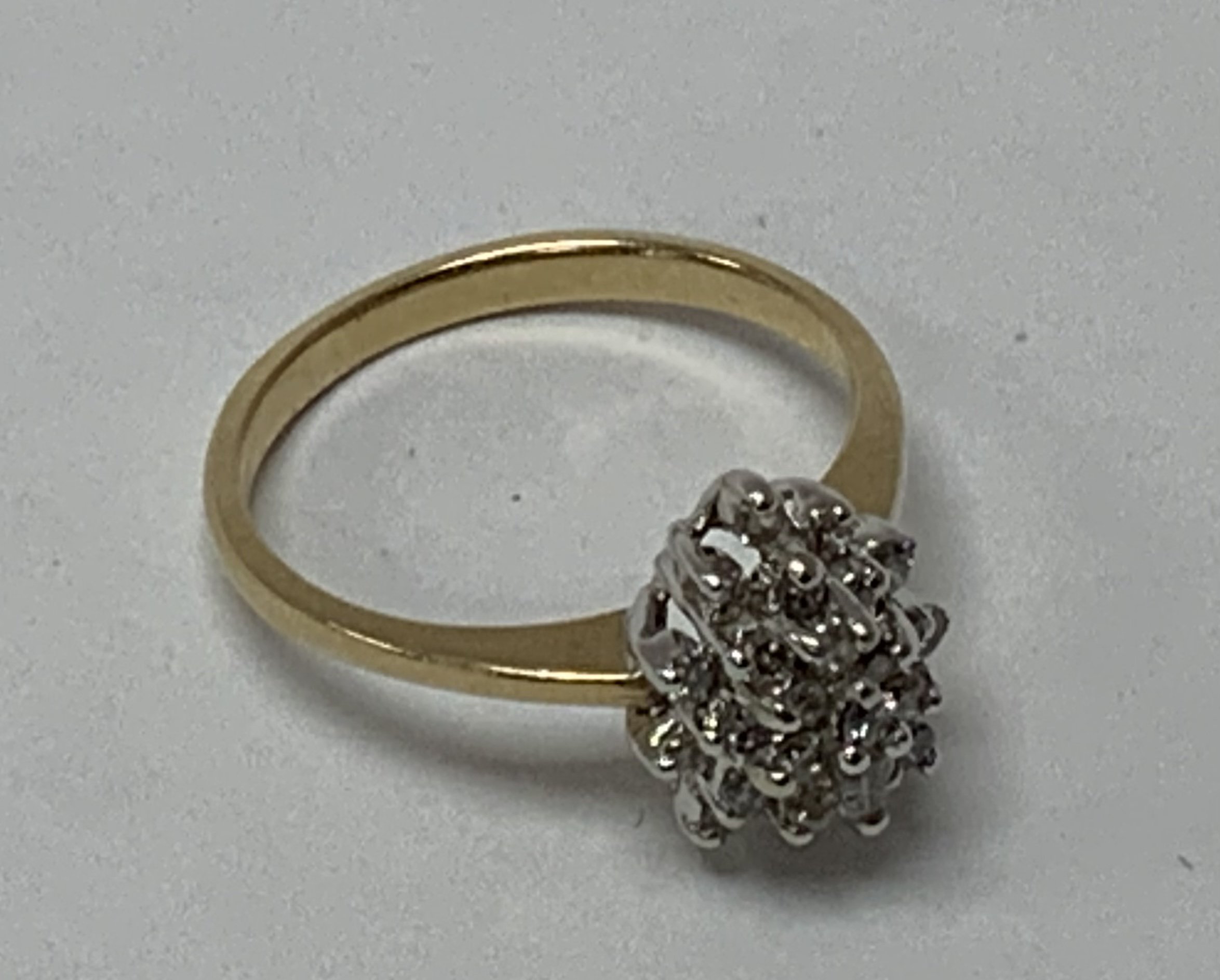 A 9ct gold diamond cluster ring, L. (A)