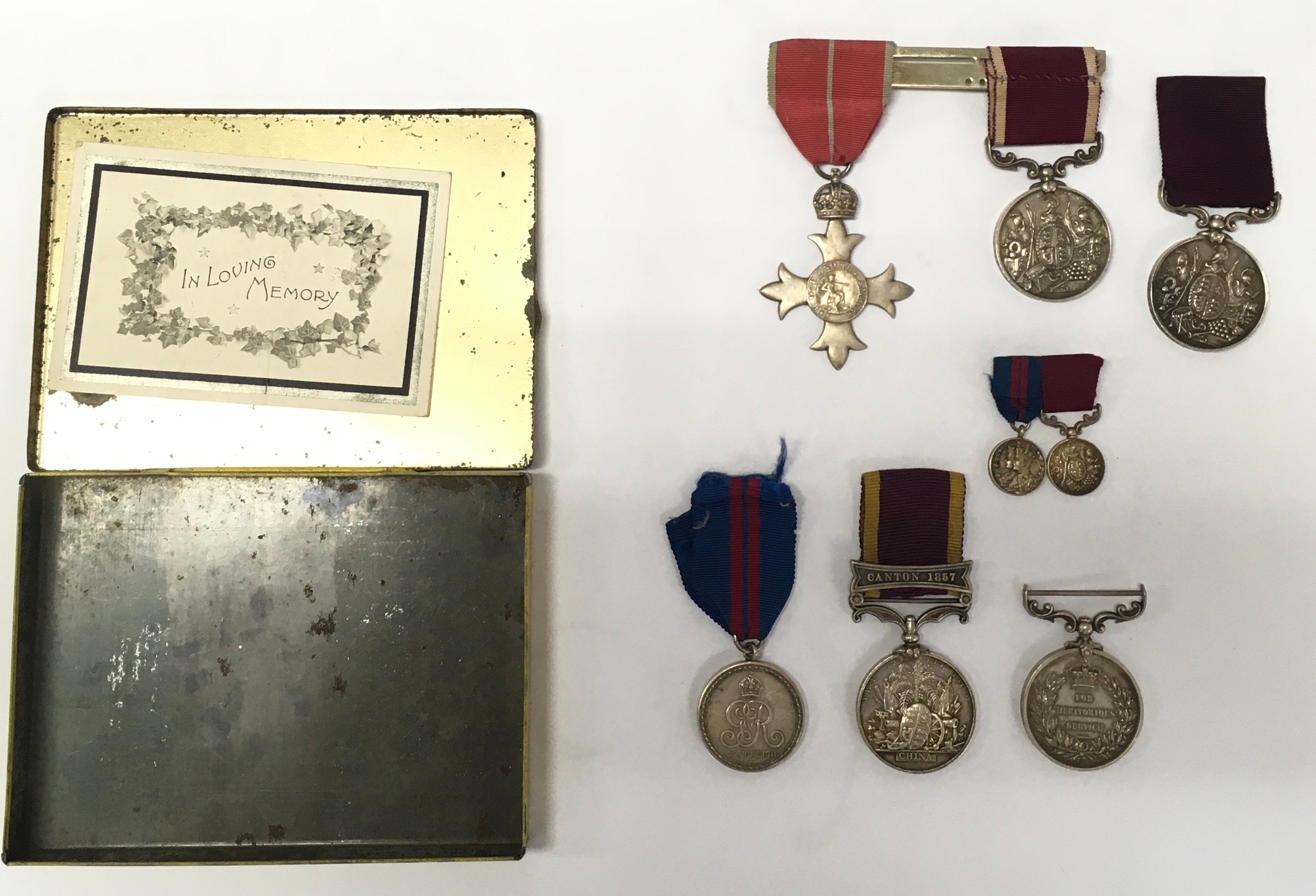 Victorian, China, Medal with Canton 1857 bar, named "serjt  John Rycroft no 4B 12th brigade Rl Arty", Victorian LSQC to " 358 QrMr serjt J Rycroft 12th Bde R.A.." Evie for meritorious service medal " QrMr serjt J Rycroft R.A. Also memorial card of his death in 1908. LSQC 10 24191 3/cl MR Gr F Rycroft R.A. And unsigned Delhi Durbar 1911 medal and miniatures along with a military MBE and trench art 1917 flower posy holders.
