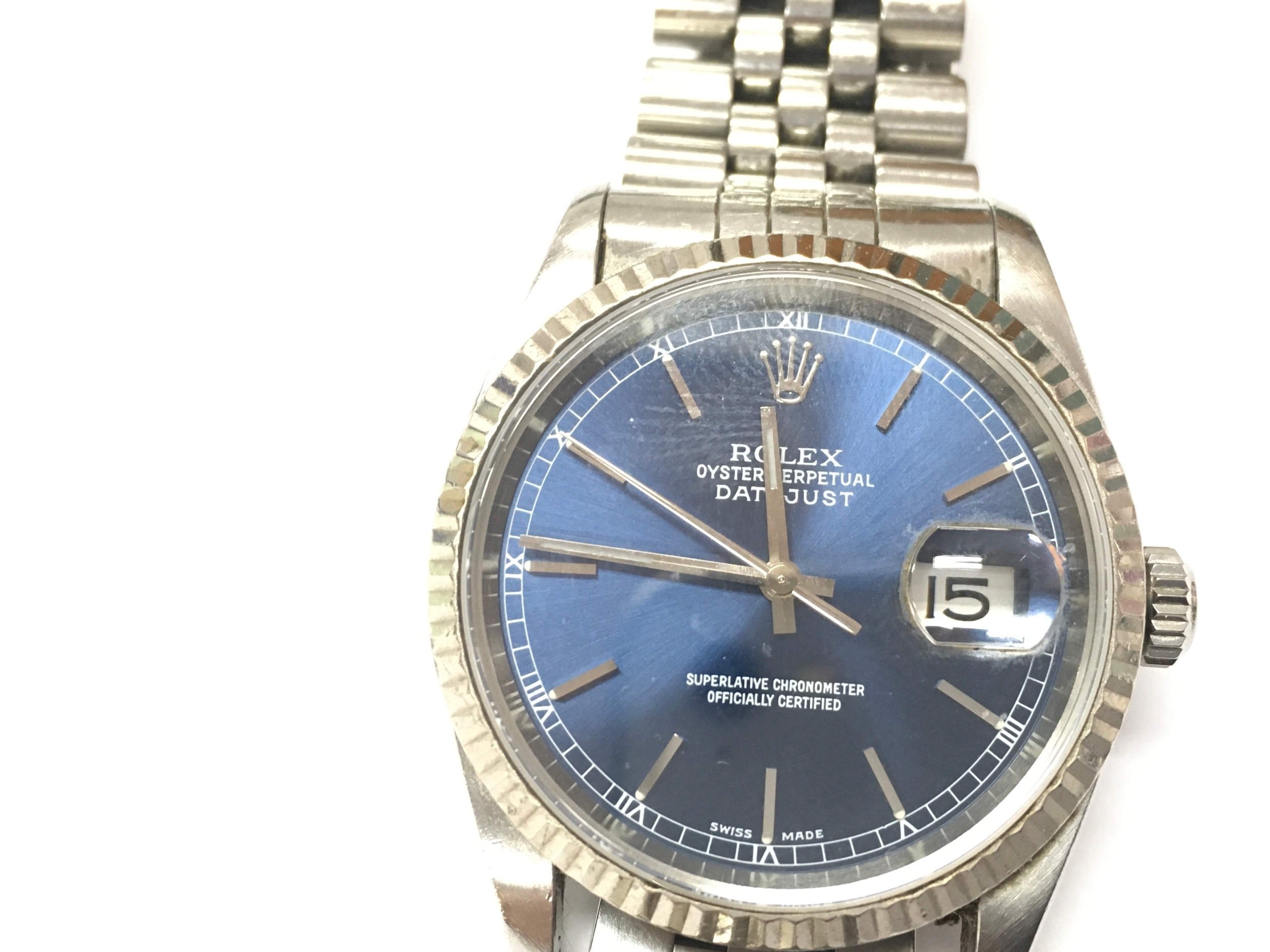 Rolex Datejust 16234 features a vibrant blue dial with Roman numerals. Box and papers. Seen running.