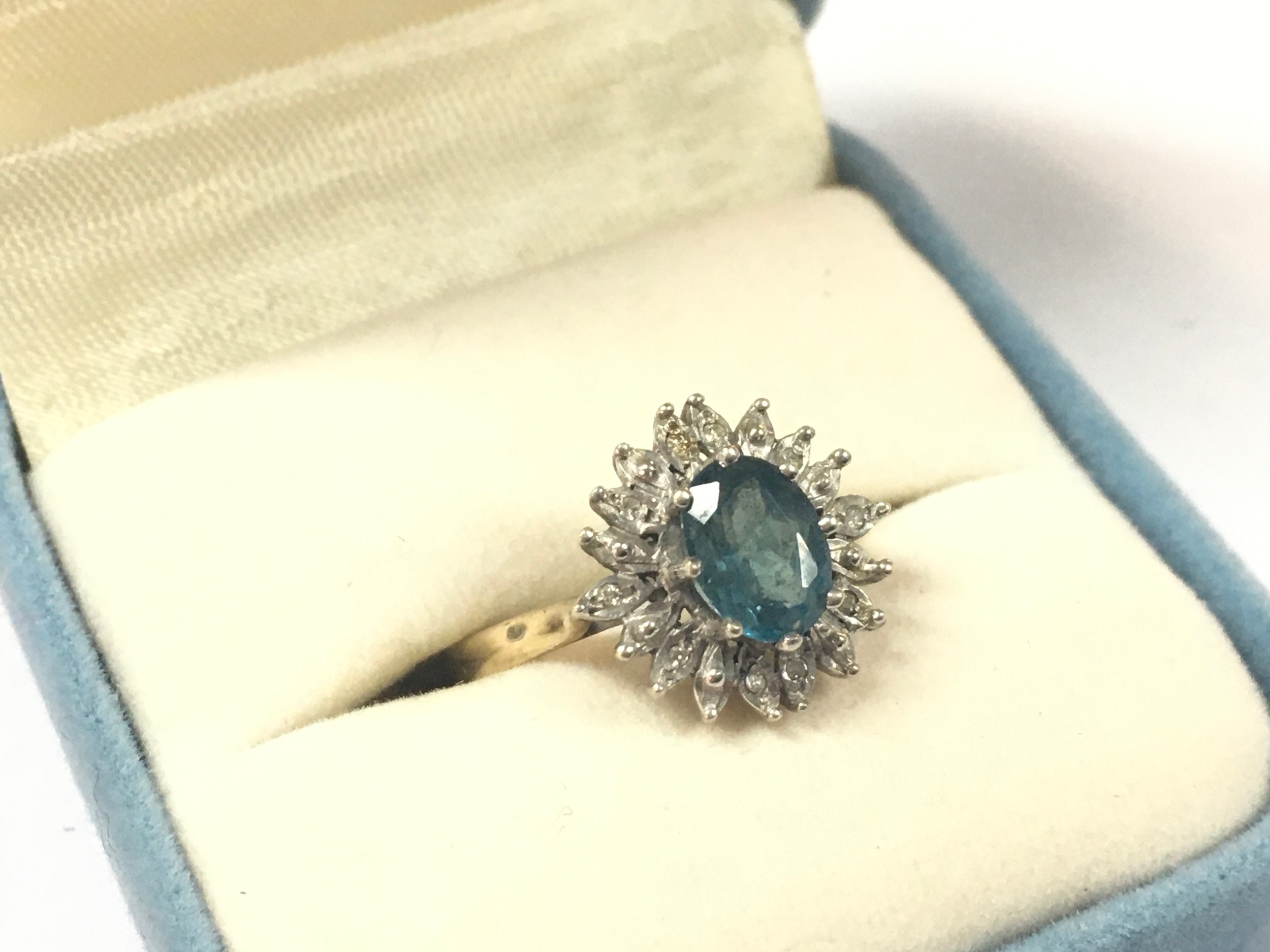 A 9ct gold ring set with a blue topaz, size P. 3.6g
