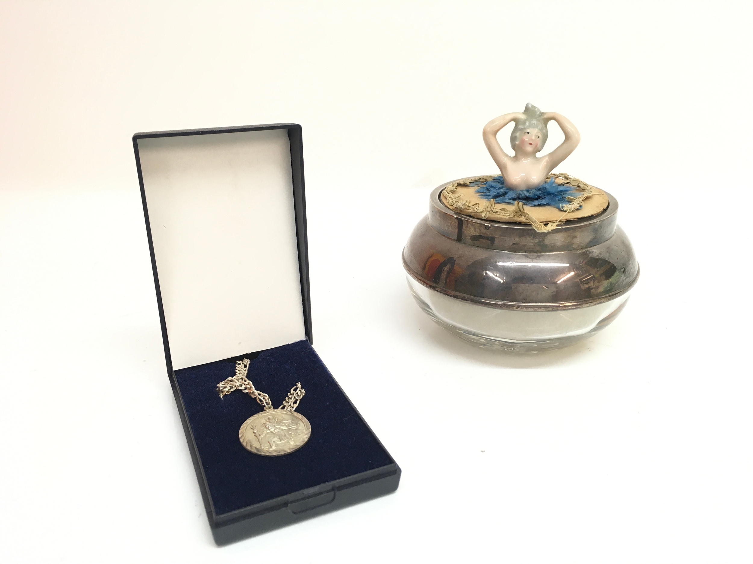 A silver and glass powder puff silver St Christopher necklace