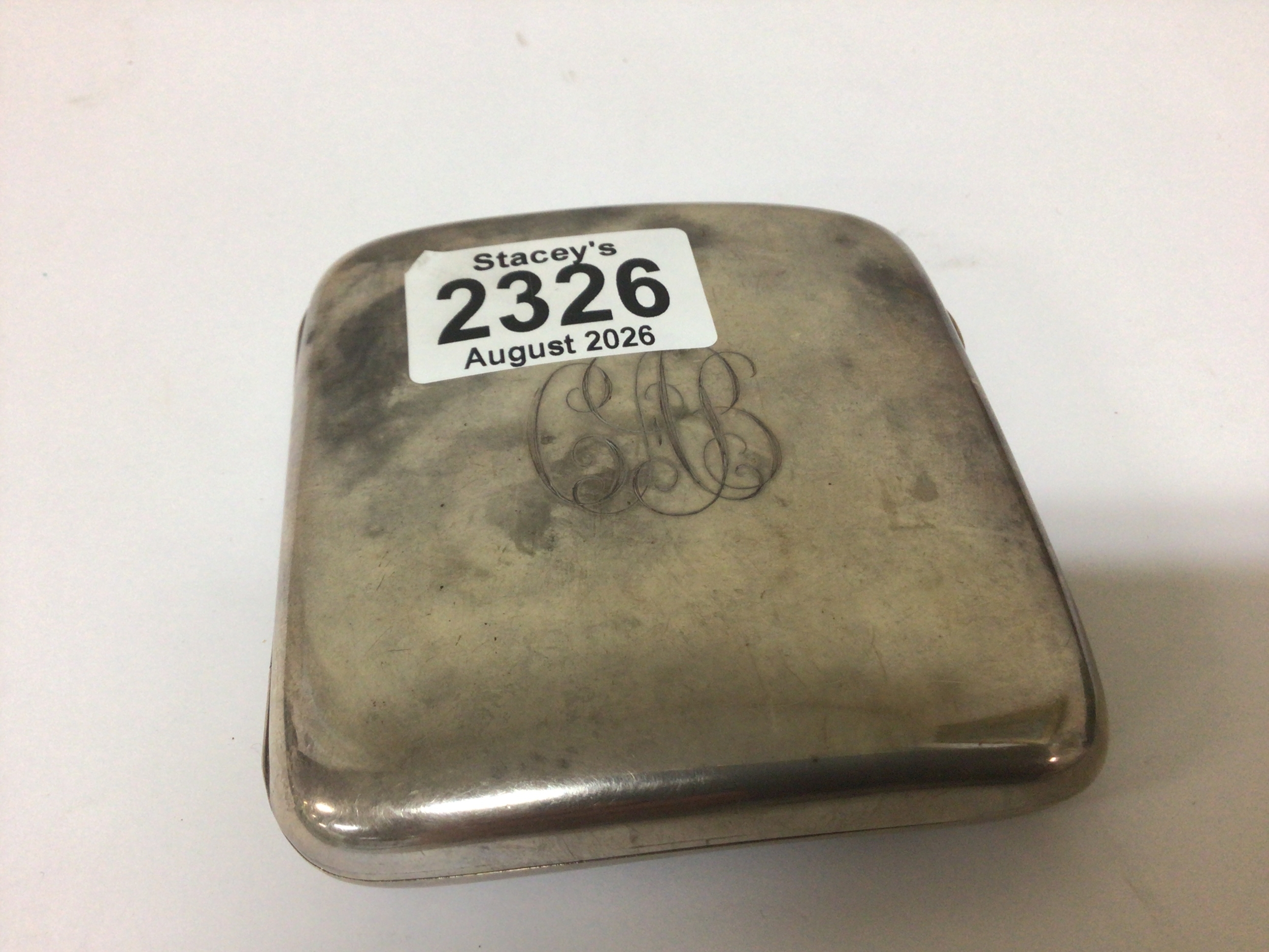 A Silver cigarette case Chester hallmarks the front with personal inscriptions.weight 145g 