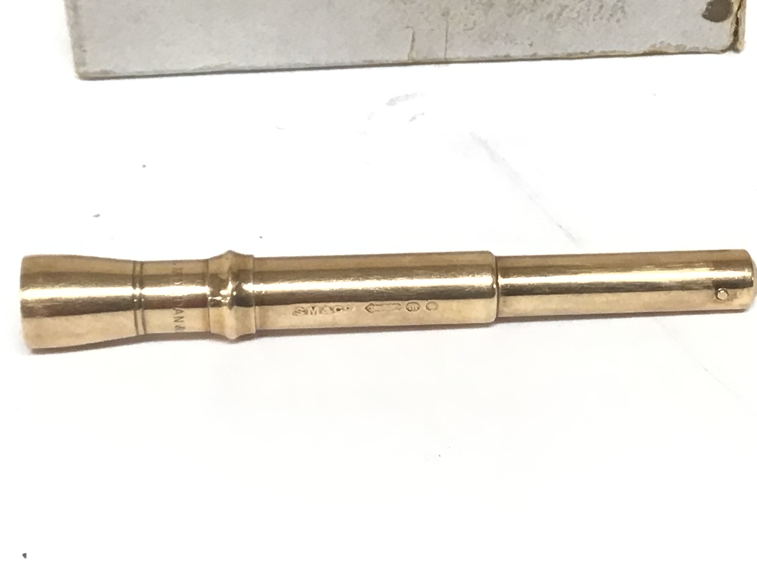  A 9ct Gold S Mordan & Co cigar Pointer with retractable pointer makers mark gold marks 9 375. Total weight 14g 