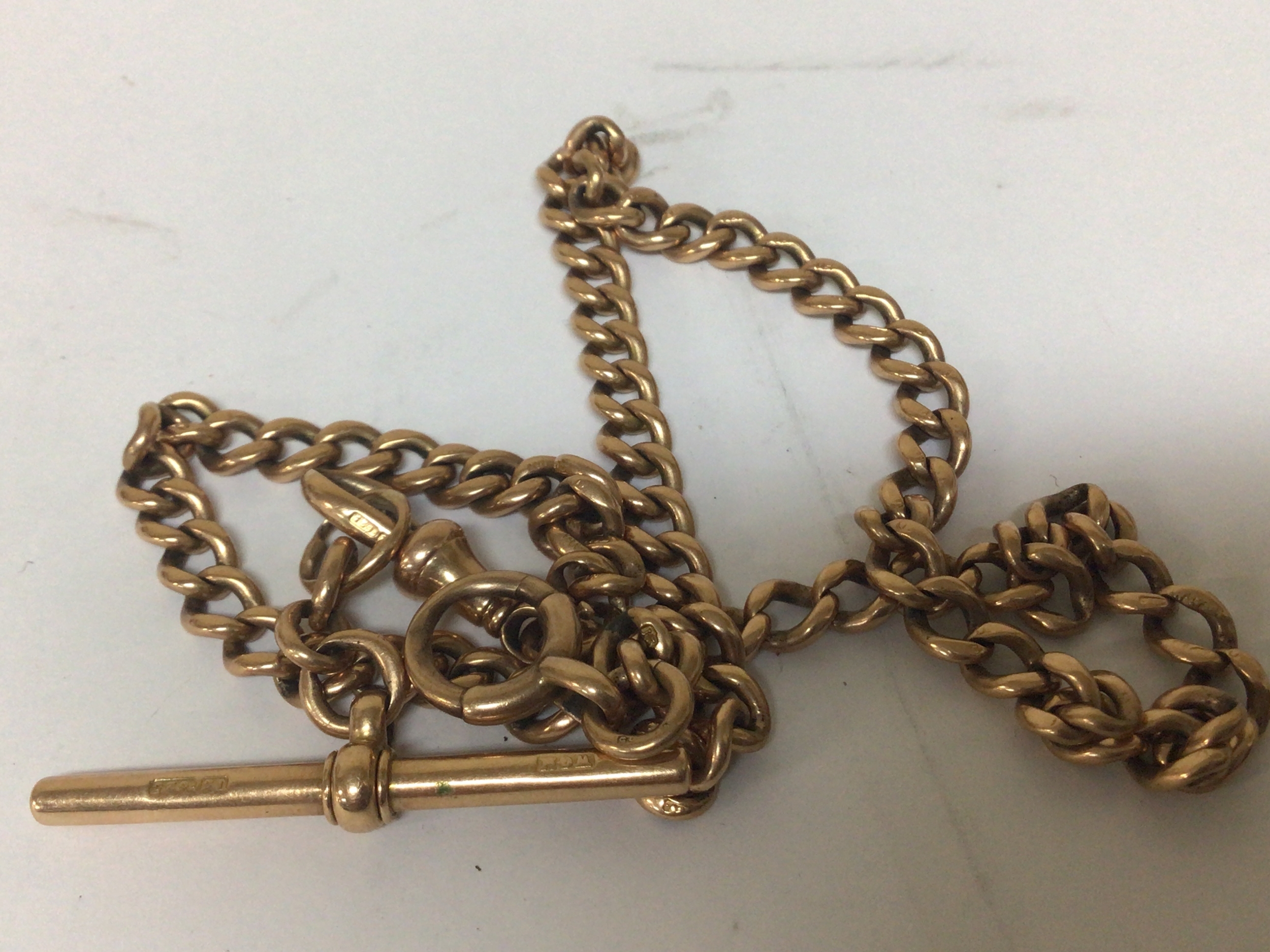A 15ct gold watch chain most links and fixing bar stamped 15 .625 weight 44.5g 