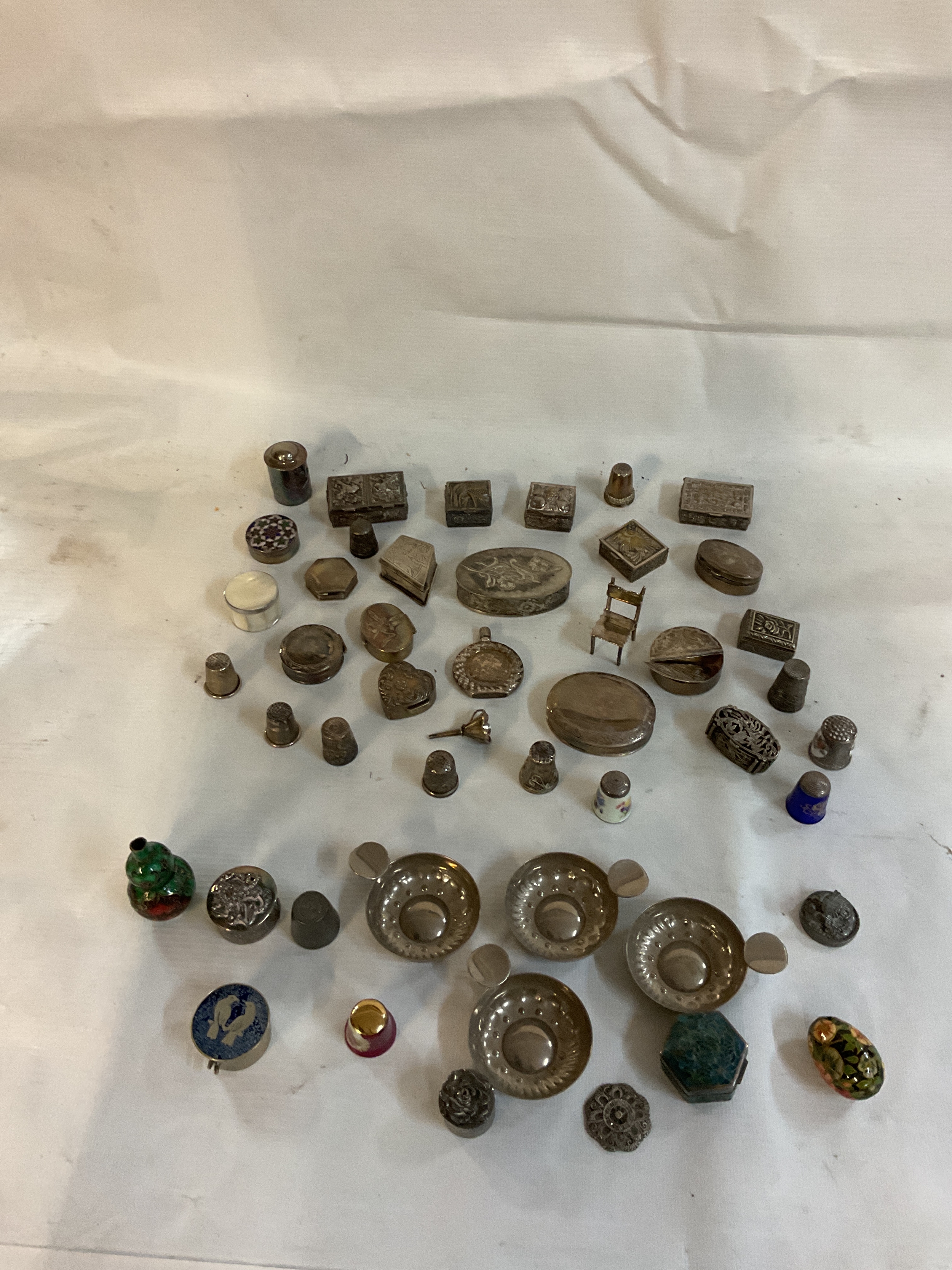 Qty of silver boxes and thimbles along with pewter and other examples.