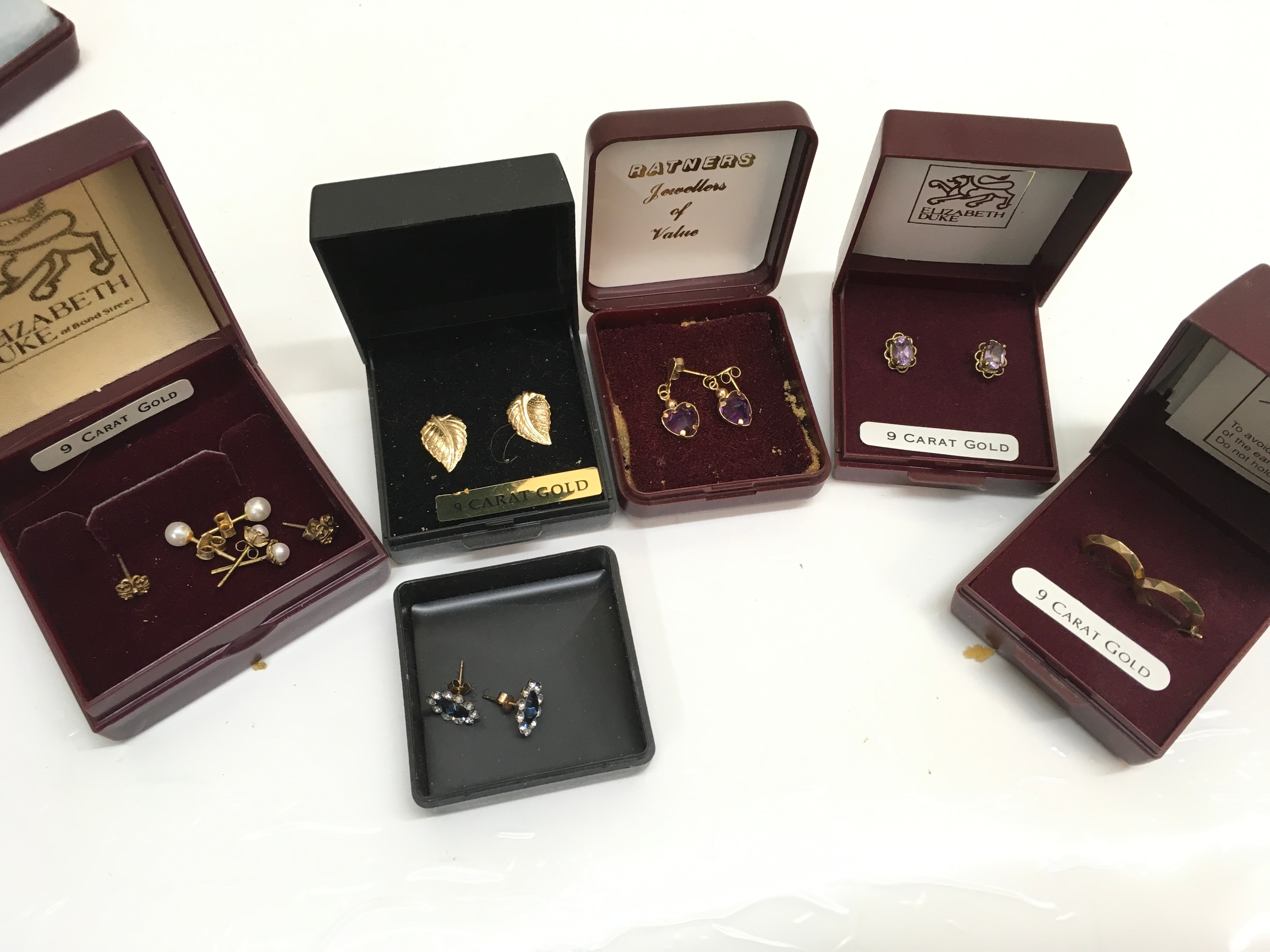 Eight sets of 9ct gold earrings. 5g