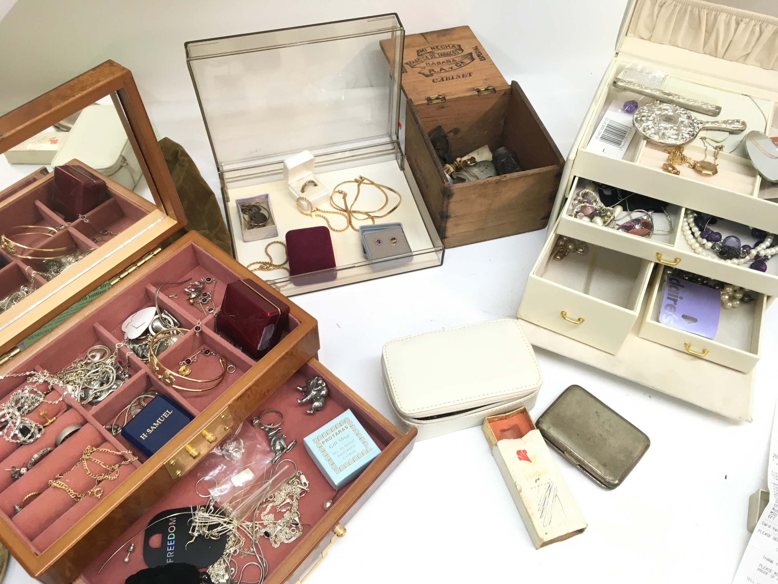 A bag of Costume jewellery including silver gilt necklaces , 9ct gold bracelet etc