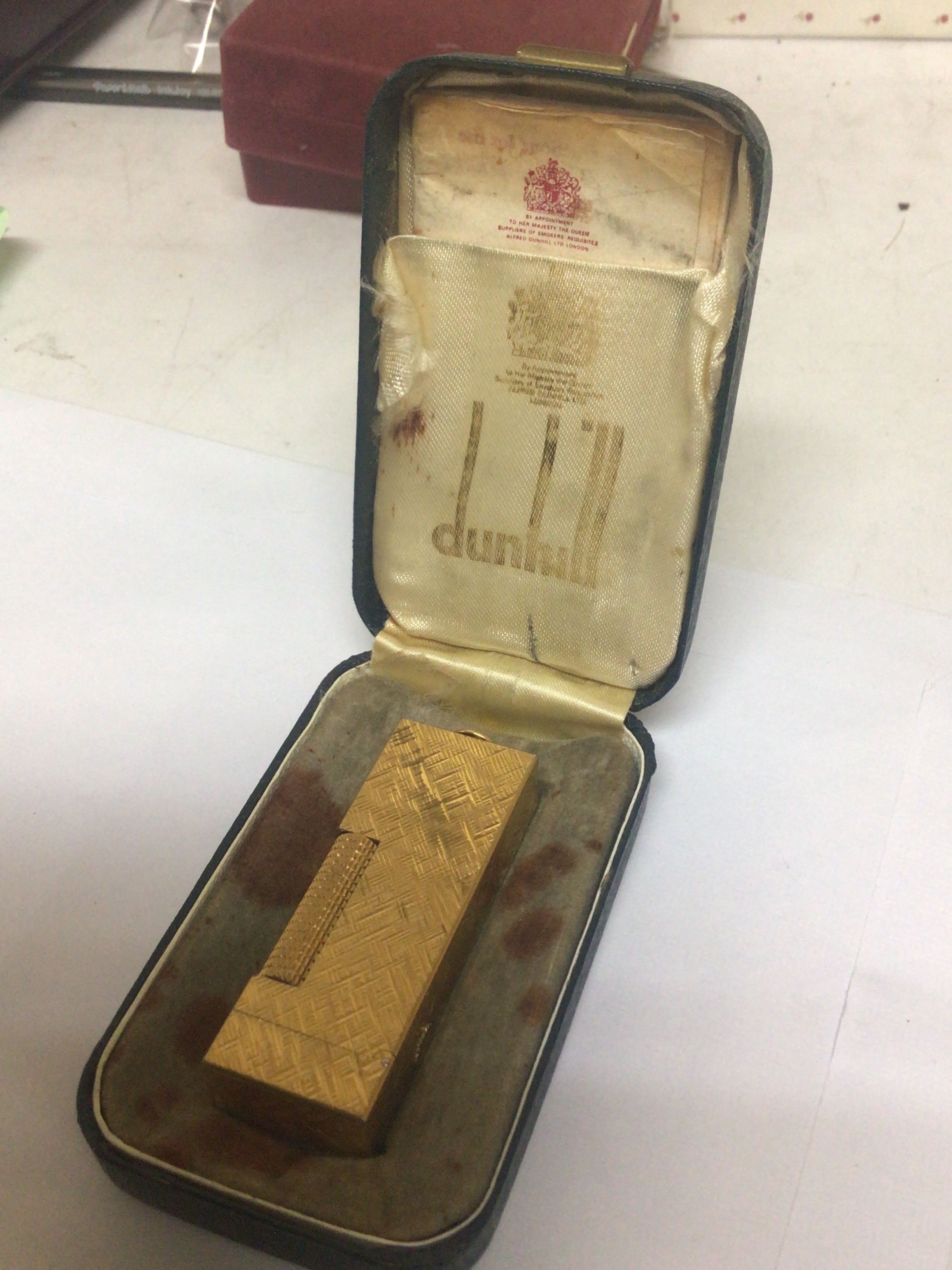  A Dunhill gold plated lighter in original box. 