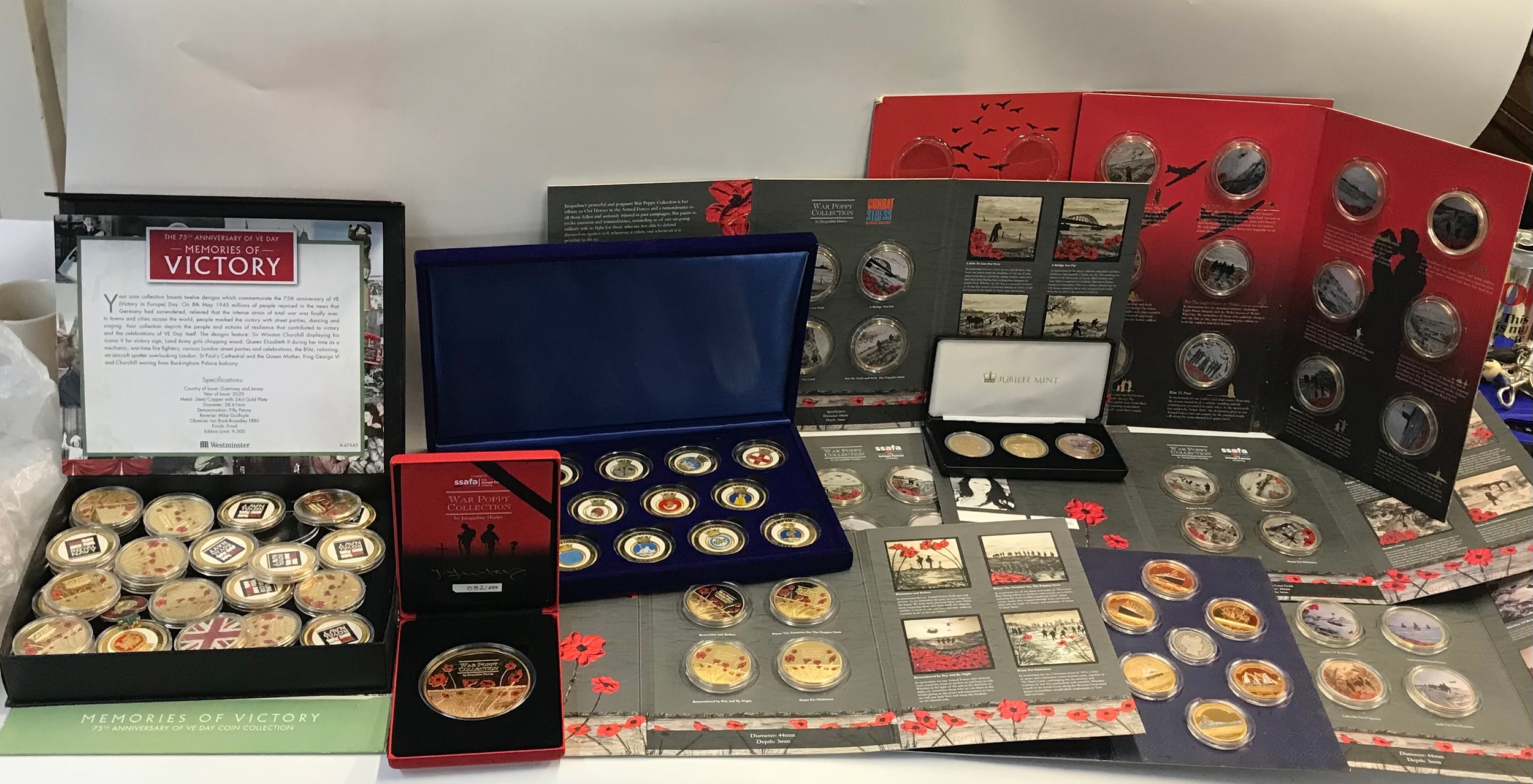 Collection of proof coins, war poppy collection, etc. 