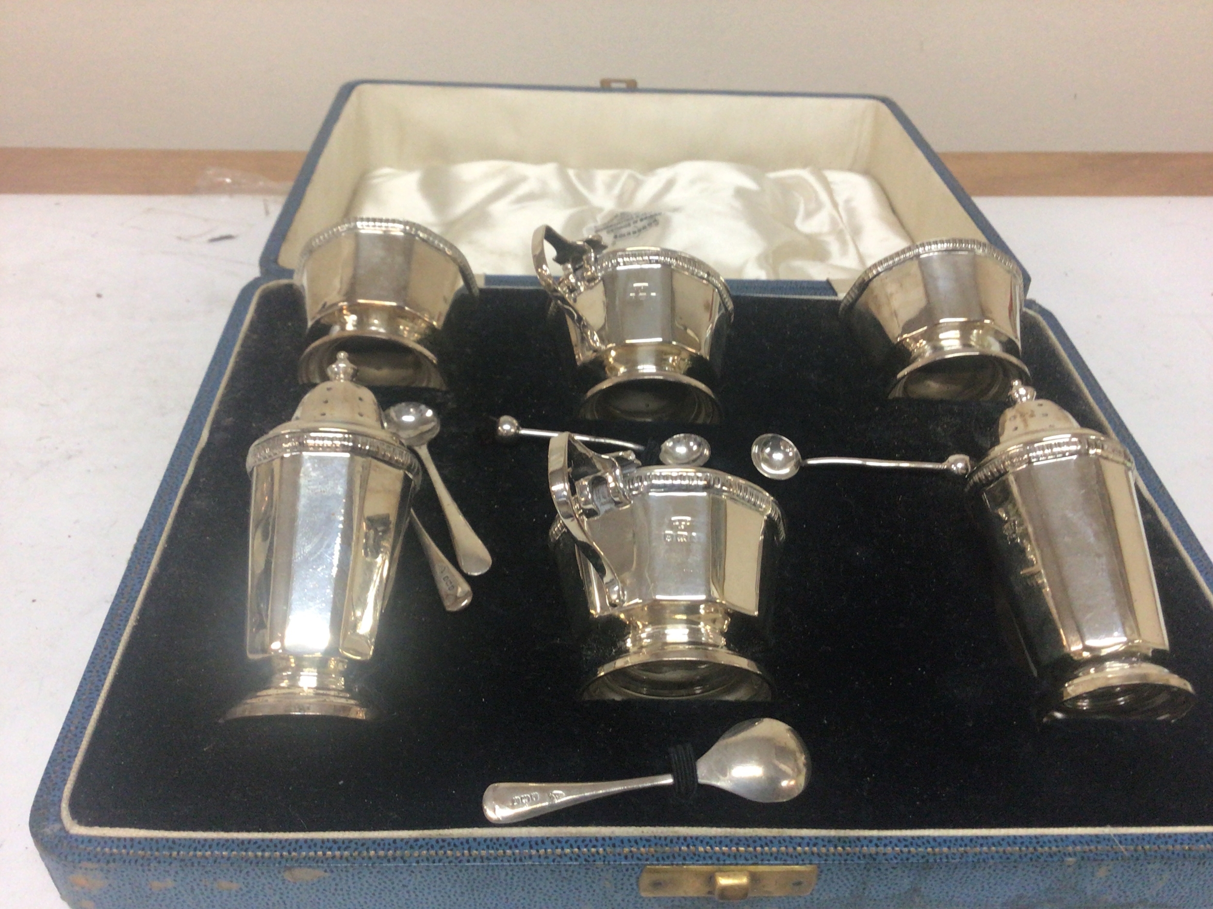  A six piece silver condiment set Birmingham hallmarks nice condition no personal inscriptions. 