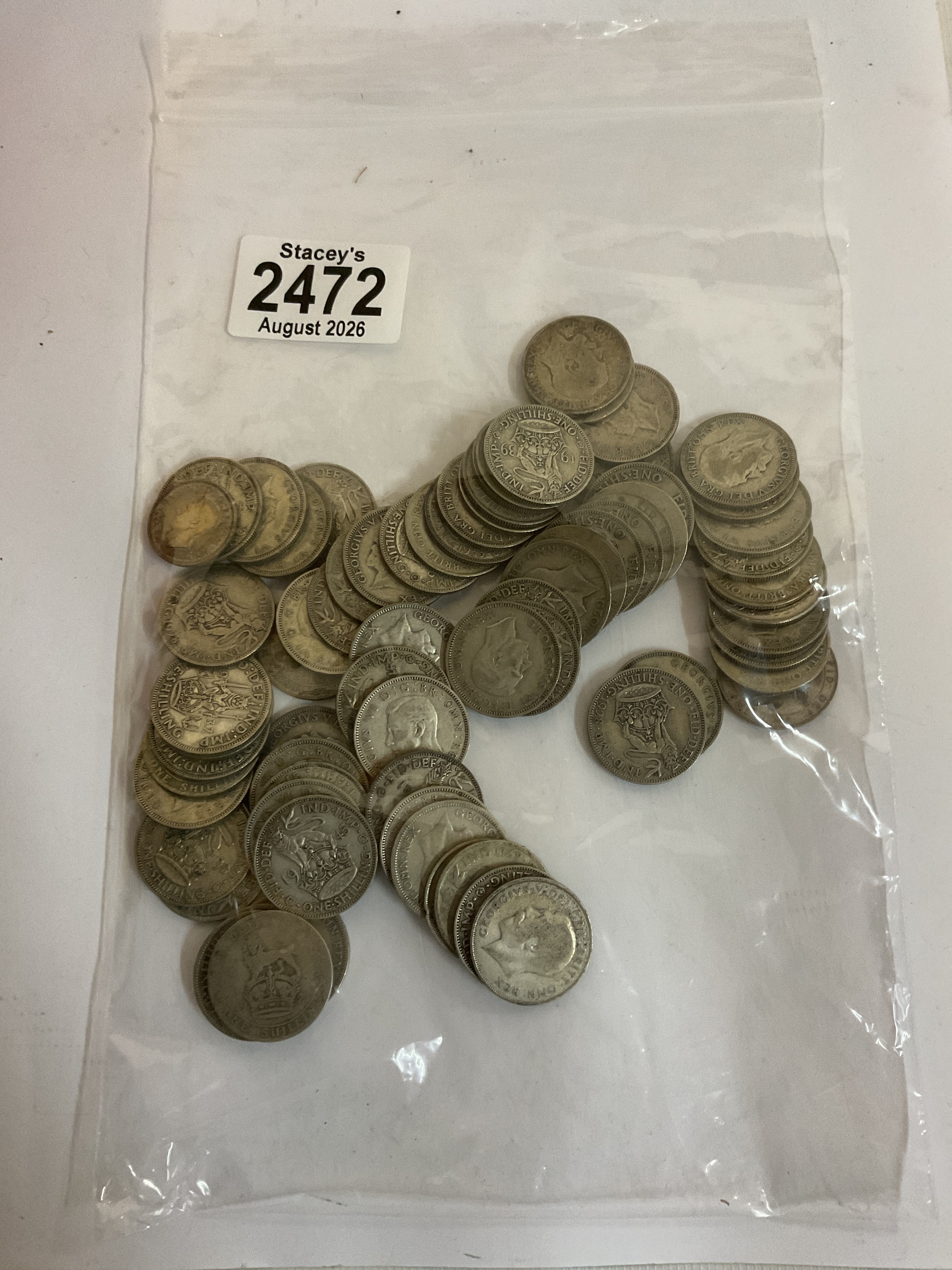 Bag of circulated pre-46 shillings.weight 380 grams.