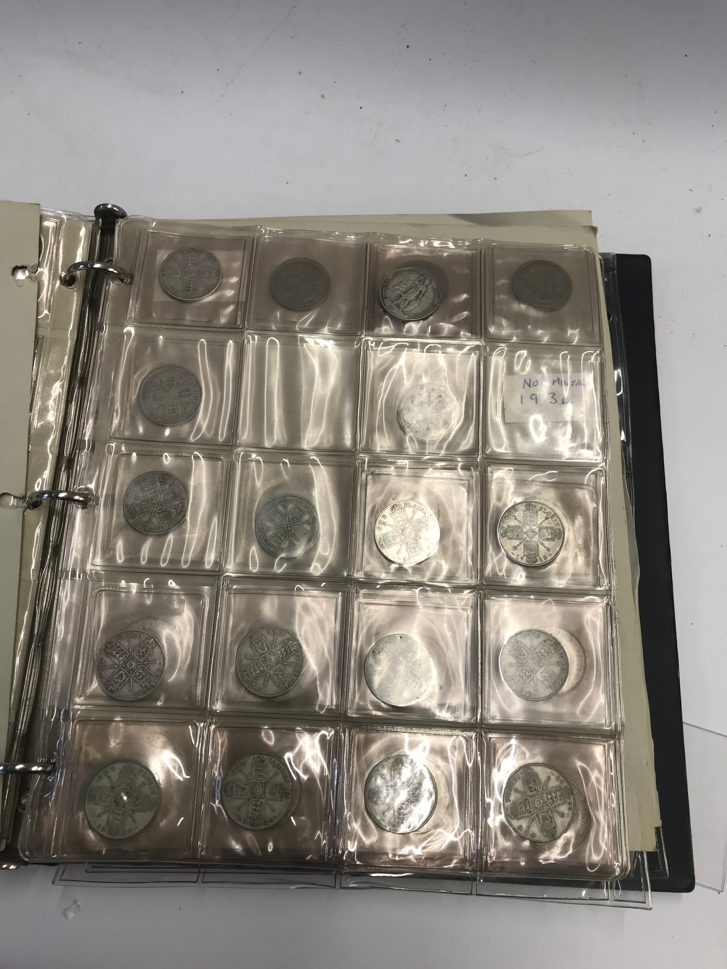 Two albums of coins,  Victorian examples and pre 46 half crowns and more.
