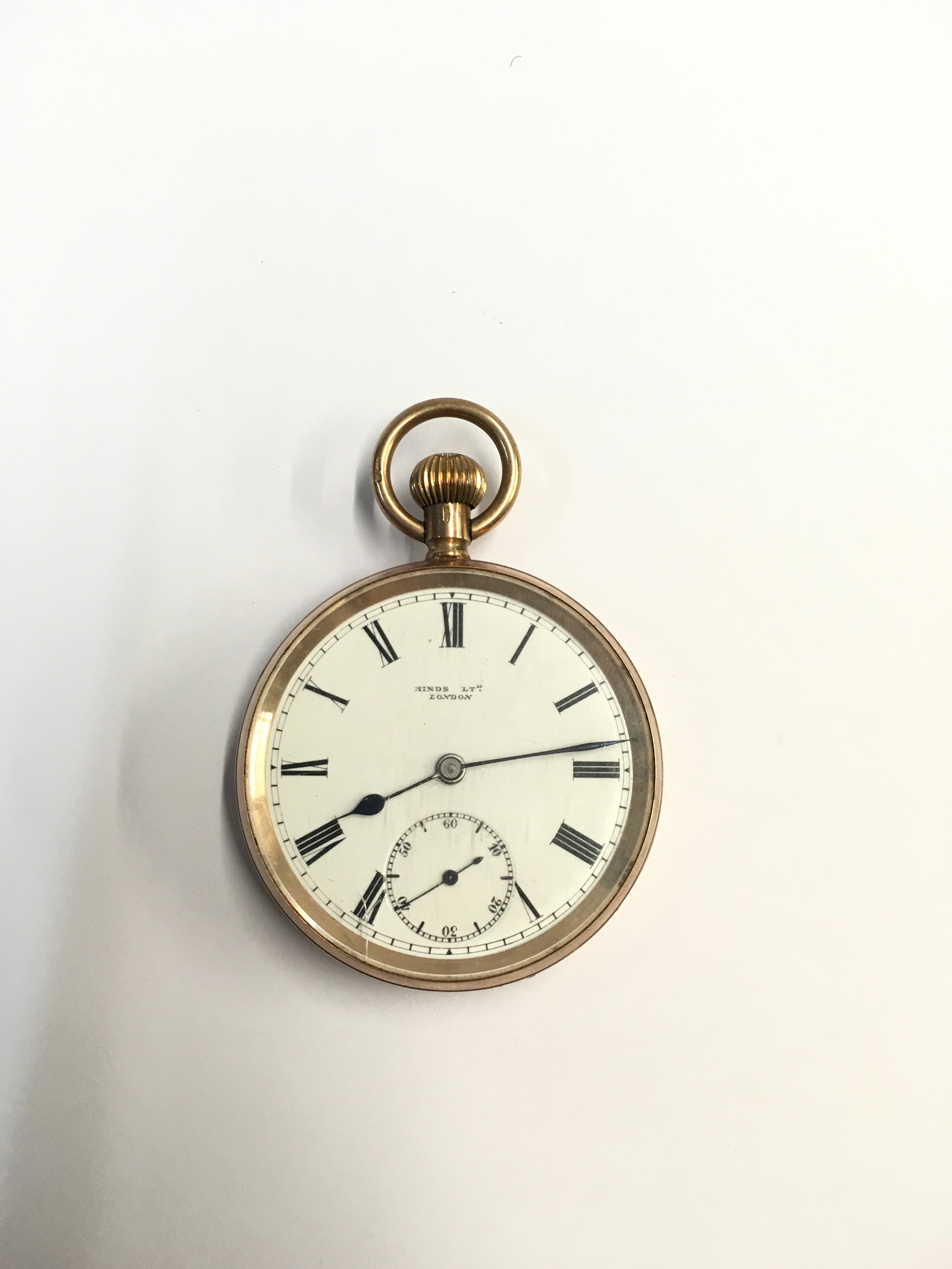 A 9ct gold button wind pocket watch. Weight 82.31g 