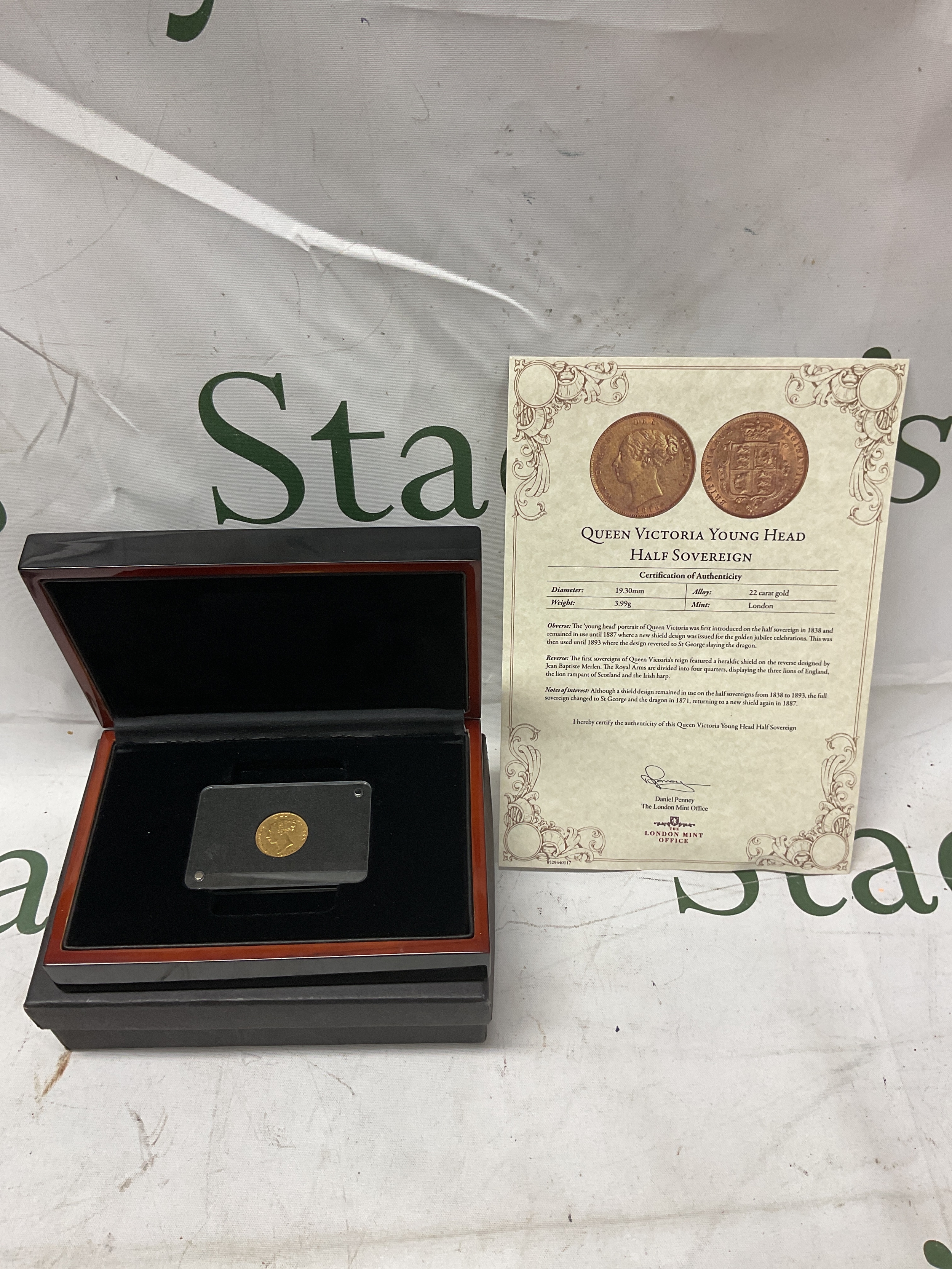 Queen Victoria Young Head Half Sovereign from the London Mint Office,cased and with paperwork an 1857 half sovereign.