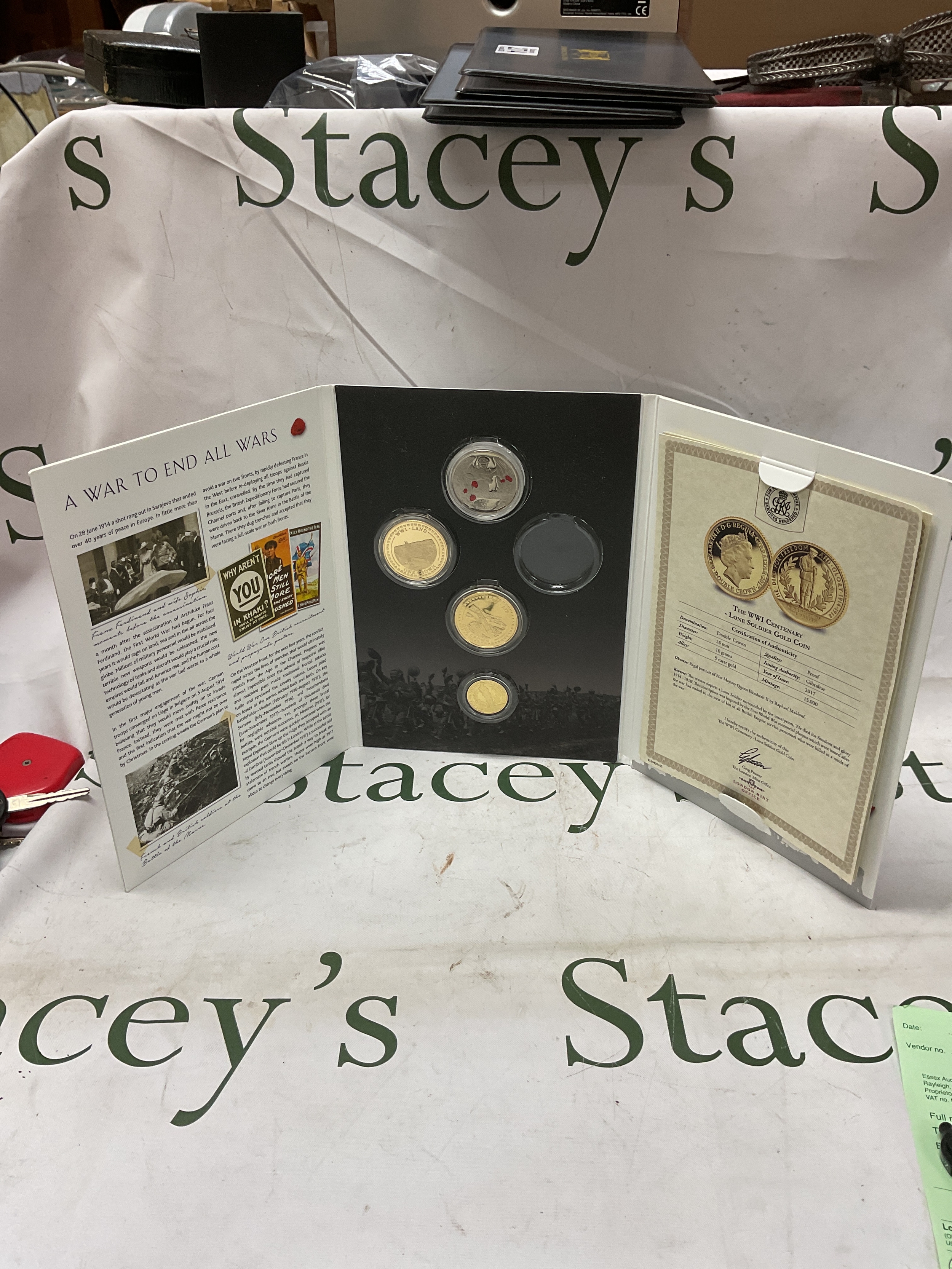 a War to end all Wars coin set to inc 9 ct 10 gram coin, incomplete set.