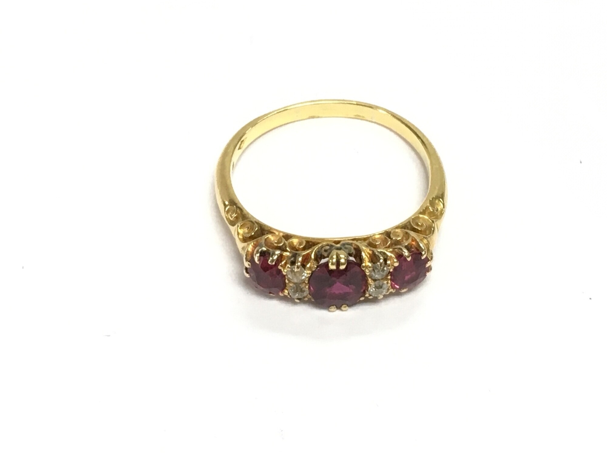 An 18ct gold ring set with diamonds and rubies, approx 4.5g and approx size R-S.
