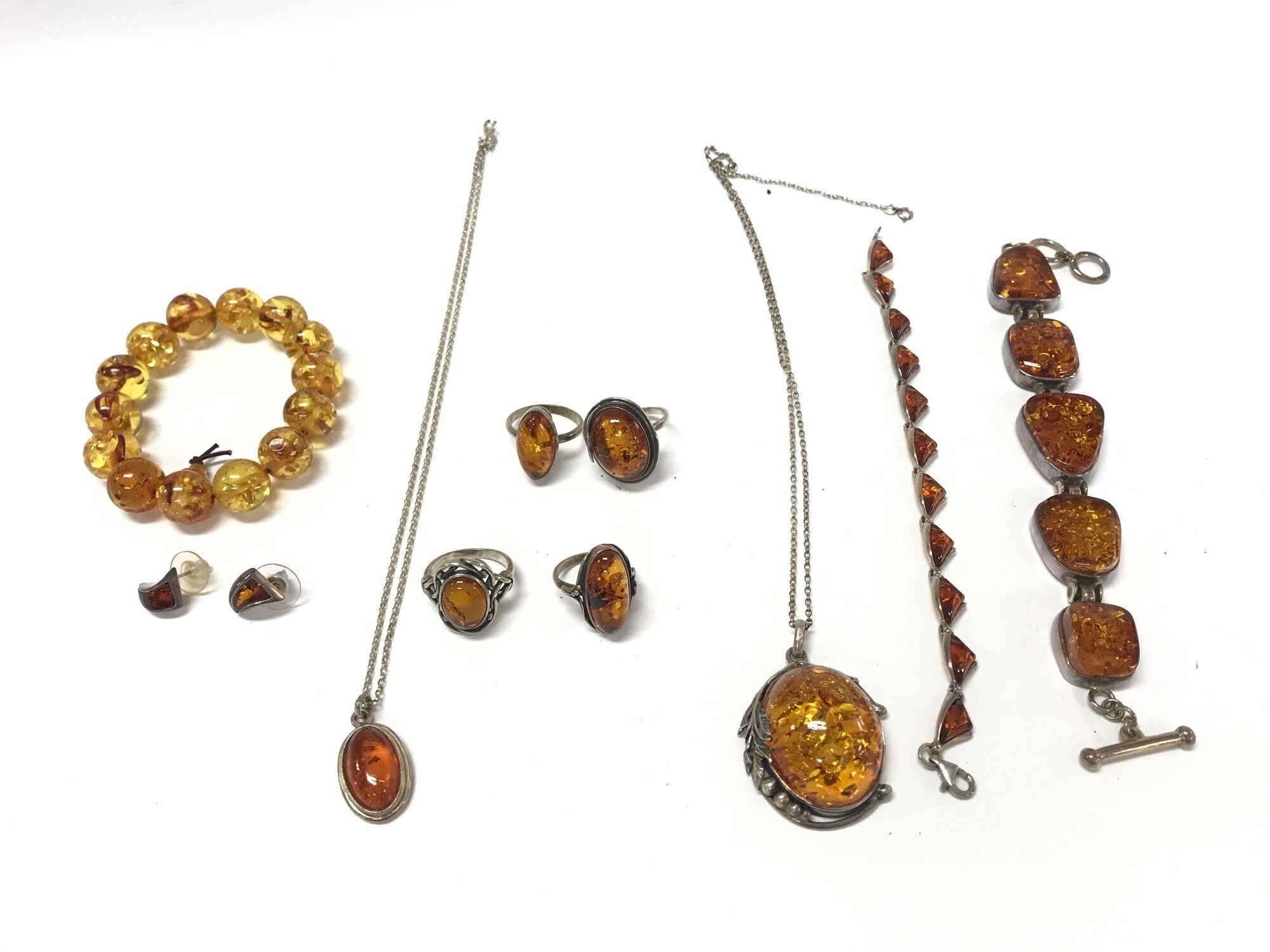 A Collection of mixed silver and amber jewellery.