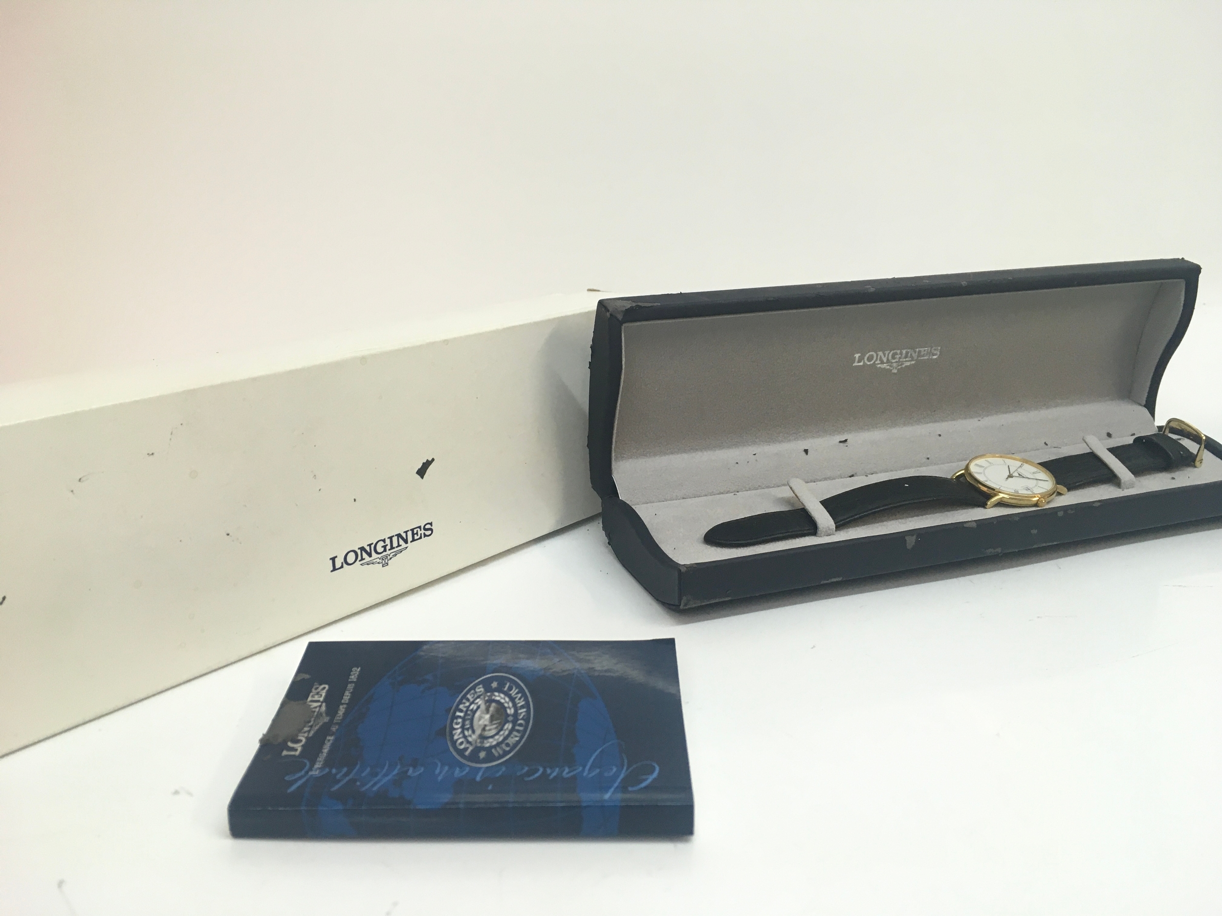 An 18ct gold cased Longines watch