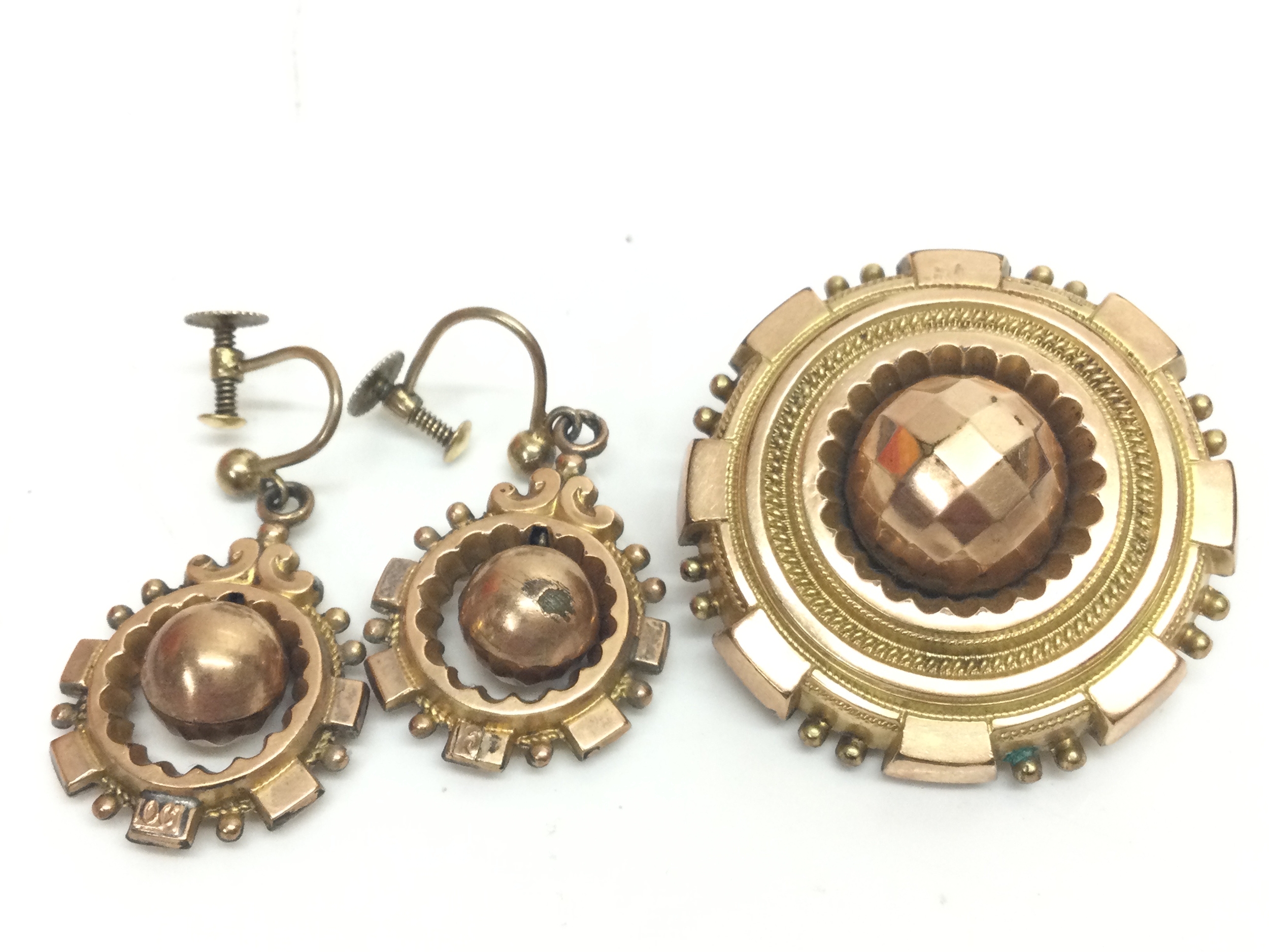 A 10ct gold mourning brooch and a pair of earrings. 11.6g total weight 