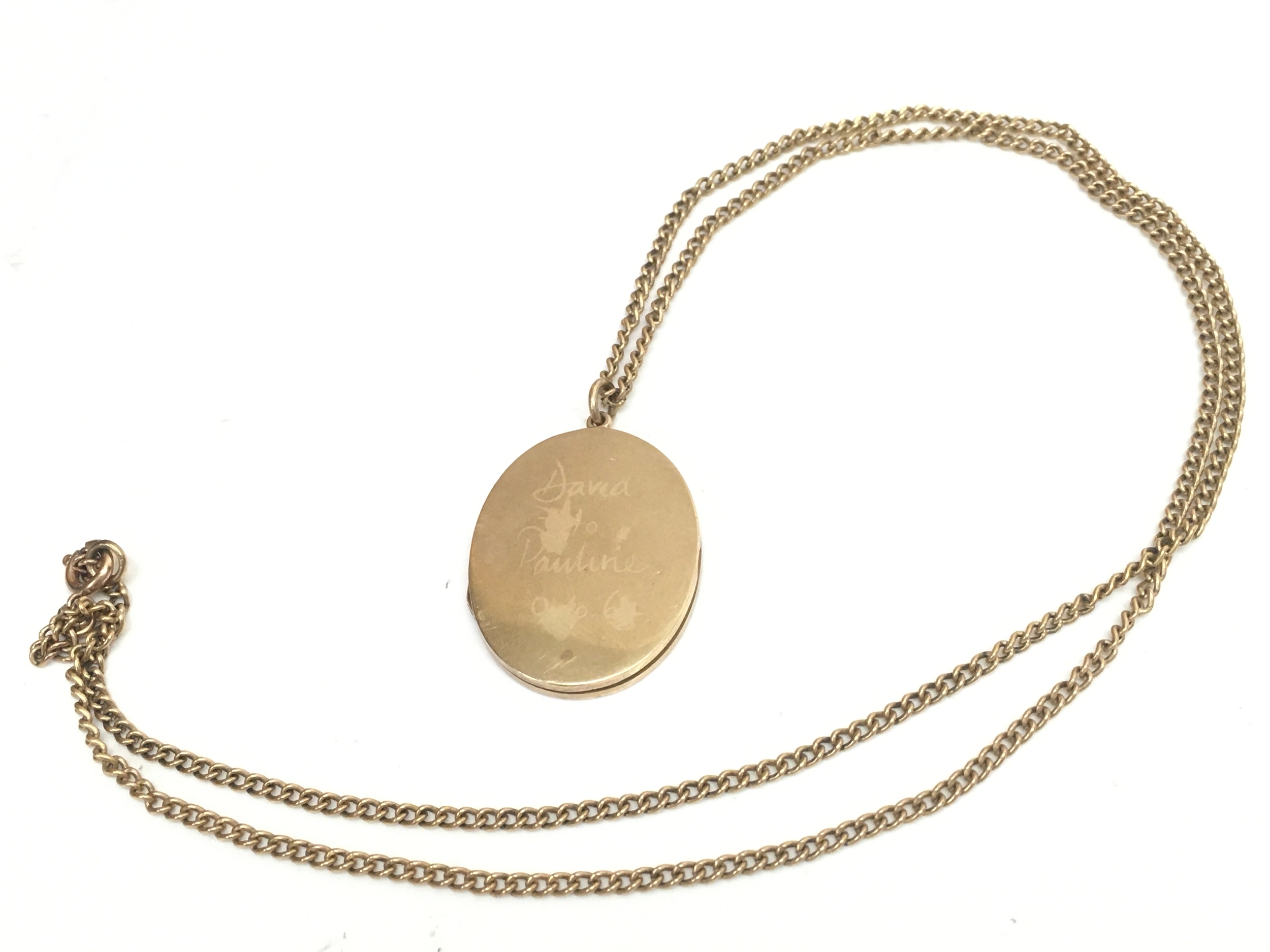 A 9ct gold locket and chain, 12g total weight