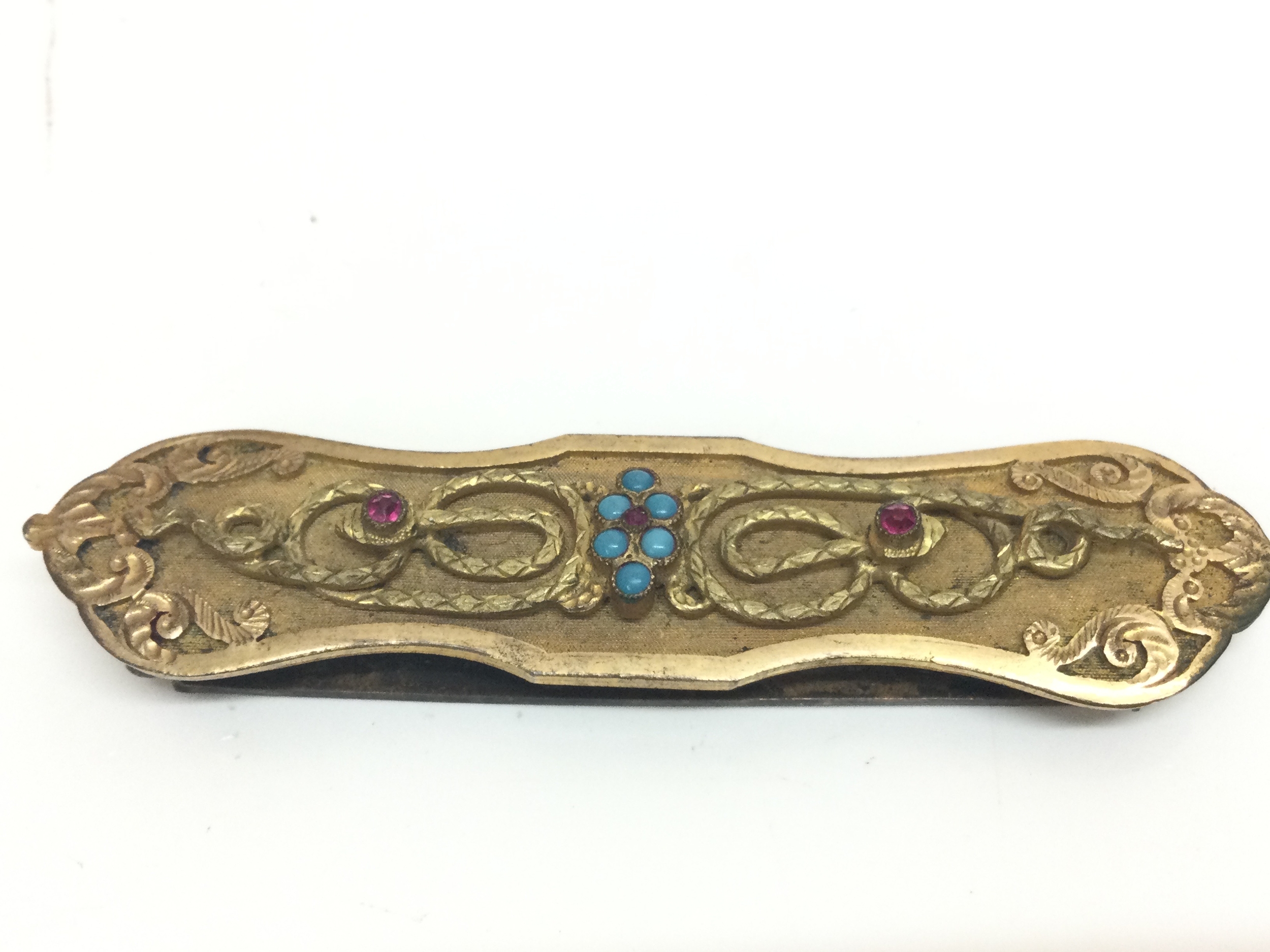 A Victorian gilded buckle, 9cm wide 
