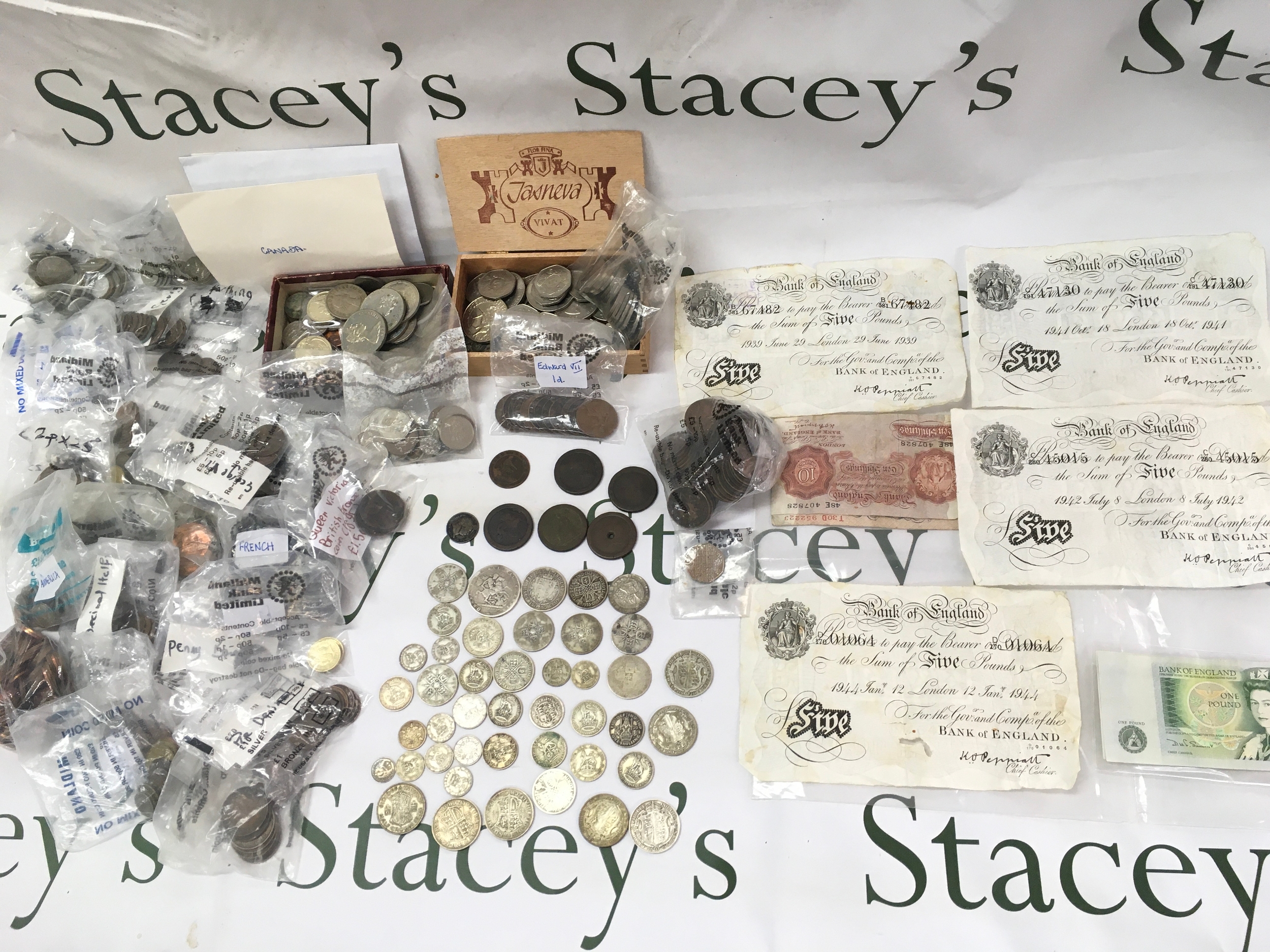 A collection of various circulated coins and bank notes including pre 1946 and pre 1920s coins and white £5 notes.