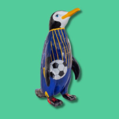 Buddy the Magic Kicker - Sponsor: BTMK Solicitors / Artist: Megan Smith-Evans / Buddy the Magic Kicker is a playful penguin dressed in a vibrant Southend United football kit, proudly holding a football. With a joyful expression, he celebrates local sports culture and the magic of football. Positioned along the trail, Buddy invites visitors to snap a photo and share in the spirit of community, fun, and camaraderie that defines Southend's love for the game. Megan is a full-time artist and tattooist based in Birmingham, with a decade of experience. After completing a fine art degree, she specialised in acrylics, sculpture painting, and pet portraits. Her work reflects a passion for creativity and a commitment to making a positive impact.- Height 1600mm width 890mm Depth 1090mm weight 30kg
