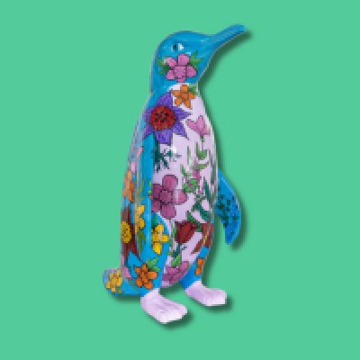 Wildflower Waddle - Sponsor: Newell Properties Developments Ltd / Artist: Lucy Hebden / This penguin is inspired by the wild flowers growing in and around Southend. Covered in forget-me-nots, periwinkles, bellflowers and anemones. It will remind viewers of the lovely surrounding Essex countryside. Lucy, also known as Lucy Loves Design, is a surface pattern and printed textile designer. She develops her artwork into digital patterns for fashion, interiors, stationery, and wallcoverings. In 2021, she discovered a new canvas for her creations when she began painting her designs on giant sculptures. - Height 1600mm width 890mm Depth 1090mm weight 30kg